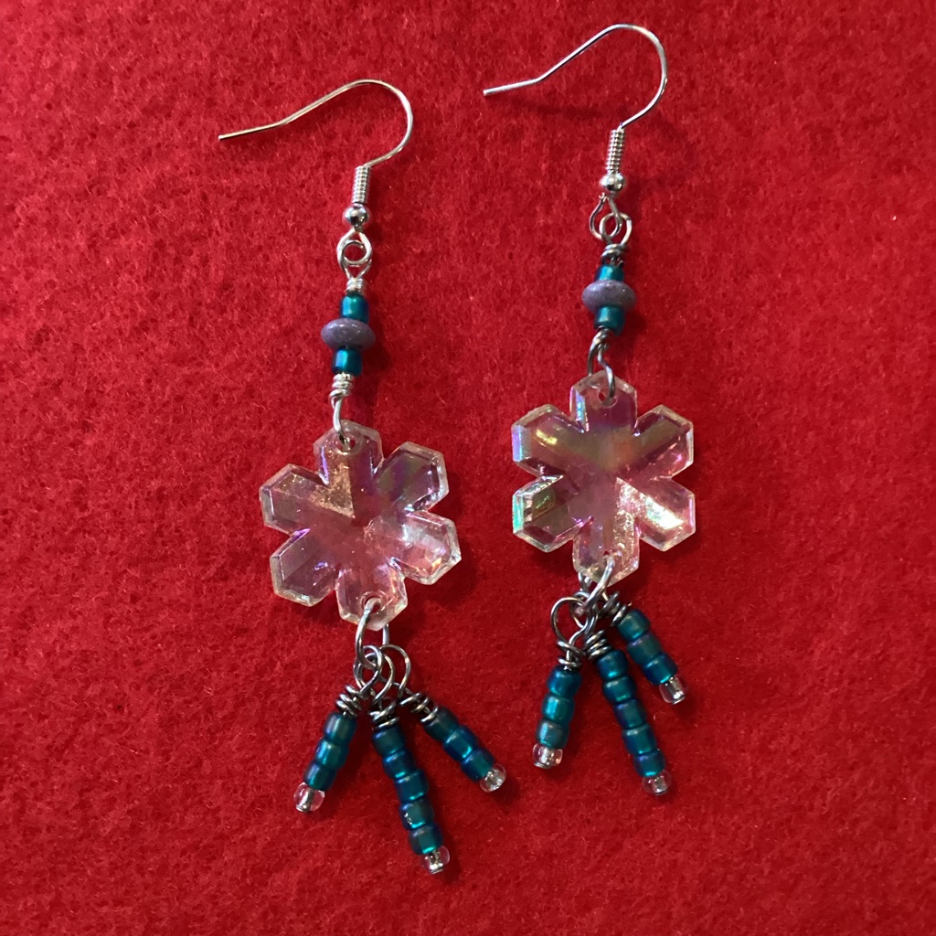 Boutique: Elegant Snowflake Earrings With Blue Accents